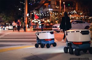 Mobile robotics from Cartken delivering goods in a busy city