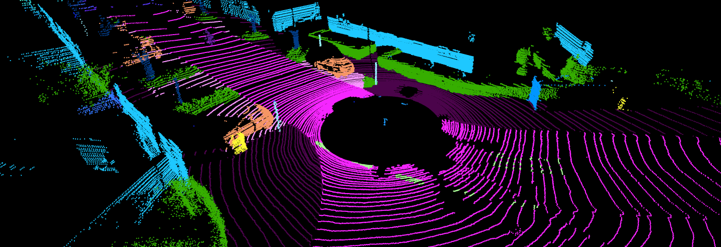 A vibrant 3D LIDAR point cloud image of an urban street with vehicles and buildings, featuring a circular roundabout, is enriched with SemanticKITTI data for enhanced SEO.