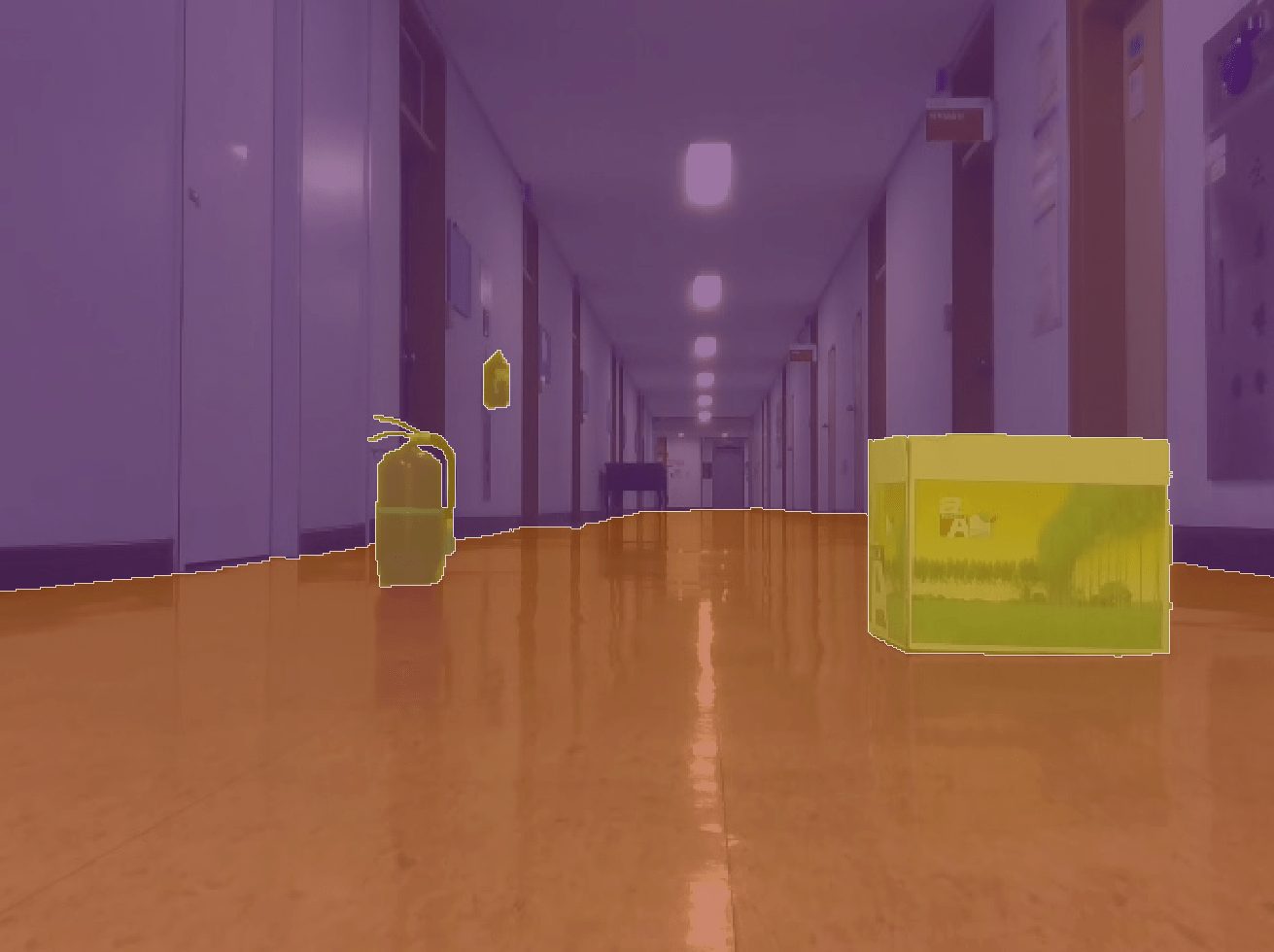A hallway with doors on both sides. A fire extinguisher, a small container, and a box are placed on the floor, hinting at nearby classrooms dedicated to teaching and education.