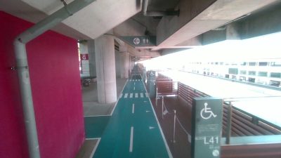 A former Formula One track in Japan with a photorealistically painted road designed for pedestrians, resembling an actual road from certain angles.